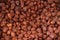 Candied peanuts background. peanuts in caramel brown texture