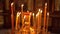 A candilo is a large candlestick in front of an icon in an Orthodox church.