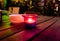 Candle And Ashtray On Wooden Table