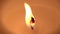 A candle is blown out in slow motion