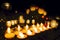Candle on cemetery at All Saints\' Day
