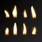 Candle fire flame isolated. Realistic candle bright flame decoration on black