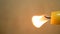 Candle flame on a wooden background vertical footage