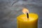 A candle is an ignitable wick embedded in wax, or another flammable solid substance