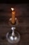 candle illuminating darkness, religious ceremonies and mourning rituals concept, meditation, tranquility, and inner balance,