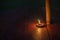 Candle lights in brown darkness for contemplative moments
