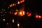 Candle lights on graves in cemetery at night on All Saints’ Day (All Souls’ Day, Halloween, Zaduszki)