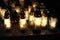 Candle lights on graves in cemetery in Poland on All Saintsâ€™ Day or All Soulsâ€™ Day or Halloween or Zaduszk