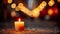 Candle placed on a table with bokeh lighting in the background, creating a warm and romantic ambiance.