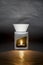 Candle-powered oil burner