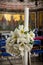 Candle. Special Decor for Baptism. The baptismal font and the priest table. Baptism ceremony