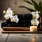 a candle and towels on a wooden table with a plant in the background and a candle on a