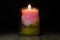 A candle with wording `Positive` lighting peacefully