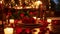 A candlelit dinner setup for Valentine\\\'s Day, with flickering candles red roses