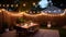 Candlelit garden, intimate dinner, romantic ambiance under starry skies.AI Generated