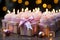 Candles aglow on cupcake, pink ribbonwrapped gift a joyous birthday scene