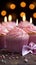 Candles aglow on cupcake, pink ribbonwrapped gift a joyous birthday scene