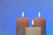 Candles background. candles on a blue background.Decorative candles.Burning beautiful candles.Religion and culture