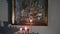 Candles burn before icon of Saint Elizabeth in monastery of New Martyrs.