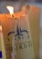 Candles glow at a shrine within the Rosary Basilica of Lourdes catholic pilgrimage site