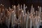 Candles glow at a shrine within the Rosary Basilica of Lourdes catholic pilgrimage site