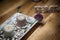 Candles with home sign blurred on wooden table- rest and relaxation