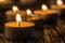 Candles light in advent. Christmas candles burning at night. Golden light of candle flame