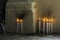 Candles lit in a church in honor of the dead on the holiday of the dead