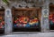 Candles and mosaic tiles along the Ave Maria Way in the Basilica at Santa Maria de Montserrat Montastery in Barcelona, Spain.