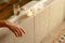 Candles Next to a Woman Relaxing in the Bathroom Spa Tub with a Glass of Sparkling Champagne