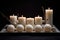 candles presented on a tray with frosted glass balls