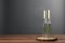 Candles in stylish glass holders on wooden table Space for text