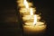 Candles on a table in a Catholic church