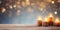 Candles on a wooden table, Christmas time, copy space, bokeh background.