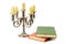 Candlestick and books