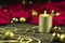 Candlestick, candles and Christmas decorations on snow against the background of a wooden board. Christmas background, greeting