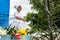 Candomble member guarding gifts for Iemanja\'s feast