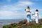 Candomble people are on the rocks of Rio Vermelho beach, offering gifts to Yemanja