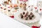 Candy bar with a lot of desserts, meringue, cupcake, fruit and sweet cakes. Sweet table for birthday or wedding.