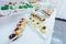 Candy bar. White festive table with deserts, tartlet and cupcakes. Wedding. Reception Tartlets