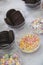 Candy and biscuits party mix, sweets in bowls, children market