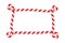 Candy cane border with swirl edges with copy space. Red and white striped frame for christmas design. Unique and unusual hand