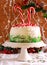 Candy cane explosion cake