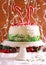 Candy cane explosion cake