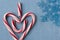 Candy Cane Heart Symbol Saying I heart U on Blue Wood with Snowflake