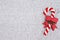 Candy cane on plush gray material background