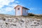 Candy coloured beach hut on Skanor beach in Falsterbo, Skane, Sweden. Swedish tourism concept