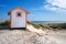 Candy coloured beach hut on Skanor beach in Falsterbo, Skane, Sweden. Swedish tourism concept