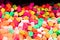 Candy A lot of sweets. Colorful texture using a background. Background rendering. Bright multiple jelly candies in