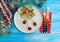 Candy, plate Christmas tree border card on a wooden background, fork, knife, , menu